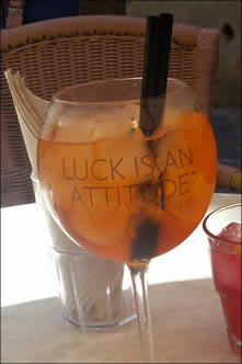 Glass of Aperol Spritz on luncheon table.
