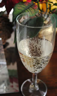 Glass of Prosecco wine at a festive celebration.