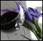 wineglass with iris flower